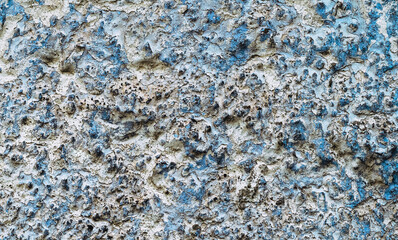 Old white, blue painted wall.