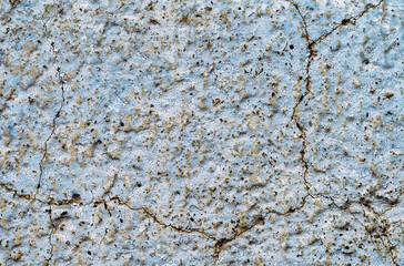 Old white, blue painted wall.