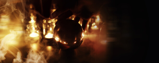 Abstract background with smoke ball and candles. Prediction of the future. Divination.