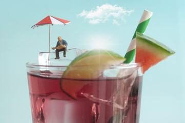 Senior man on top of summer cocktail beverage