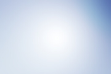 Abstract background of light blue shades with glare and bokeh effect.