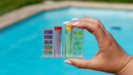 Swimming pool ph verification test kit © Pixel_Studio_8