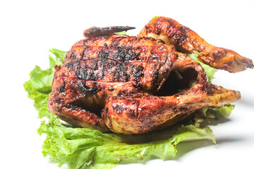 grilled chicken with lettuce leaves, isolated on white background