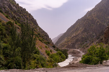 A mountain range with a river running through it
