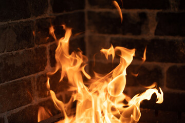 Flames in a stone fireplace