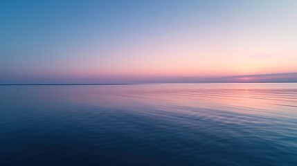 Serene Pre-Dawn Ocean Glow with Sunrise Horizon Reflection