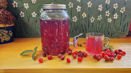 Raspberry compote on wooden background