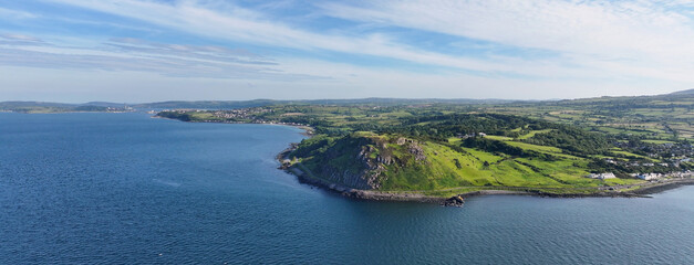 Aerial view of the Beautiful shoreline on the Antrim Coast Northern Ireland where the Irish Sea and...