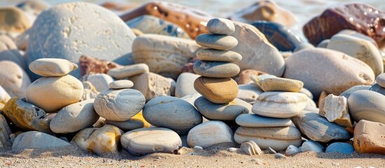 Beach stones skillfully stacked with room for text in the image. image with copy space
