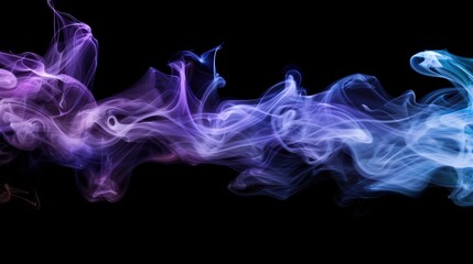 Fototapeta premium Abstract image of colorful smoke in shades of purple and blue against a black background, creating a mystical and ethereal effect.