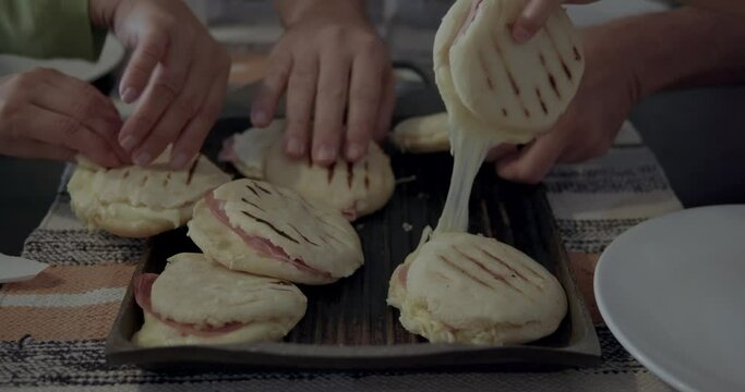 FOOD LOVER SERIES:
Traditional Venezuelan Latin American food, arepas served on the table, family meal, sharing love, protection, self-care.