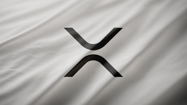 Ripple (XRP) logo illustration on a flag, cryptocurrency representing blockchain and web3, crypto innovation and decentralization concept. Rome, Italy - 2 July 2024