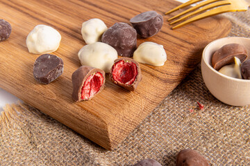 Dried strawberries in chocolate. Natural sweets