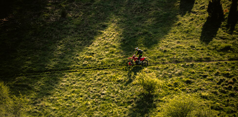 Professional enduro bike trail riding dirt road. Motocross sport.