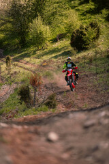 Fototapeta premium Professional enduro bike rider on action. Motocross sport.