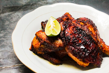 a plate of grilled chicken