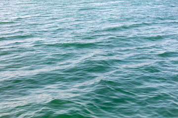 Turquoise water in the sea as an abstract background. Texture