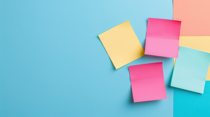 Colorful sticky notes on a pastel blue background, creating a vibrant and organized workspace. Ideal for office, school, and home use.