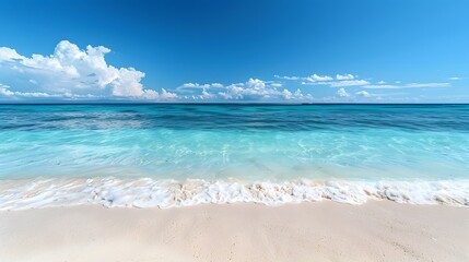 Fototapeta premium Beautiful beach with white sand and blue sky, clear water in the background.
