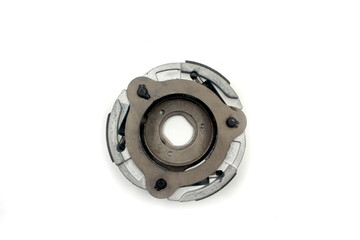 centrifugal clutch set of motorcycle or scooter on white background .Motorcycle automatic clutch uses centrifugal force with the driving shaft nested inside the driven shaft.