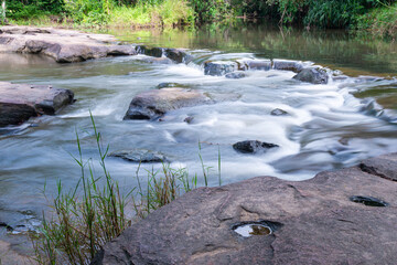 Wang Yai waterfall, Waterfalls, and rivers in Beautiful nature, Sisaket province, Thailand.The source of the river in the forest. waterfall with forest in the background.