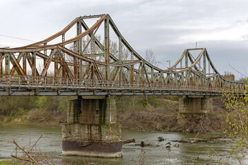 Obraz premium Old Rusty Iron Bridge Ljubichevo Over River Great Morava at Spring Day