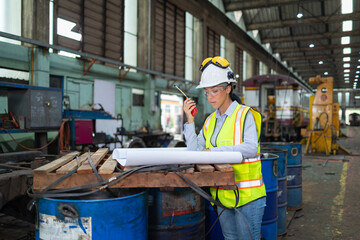 Railway Engineers Evaluating Plans at Train Depot