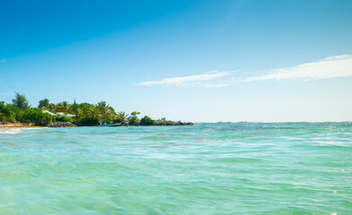 Turquoise water and blue sky in a tropical beach