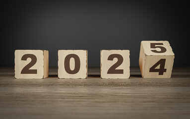 Countdown made of wooden cubes with text 2024-2025. New Year concept. Calendar sign, event,...