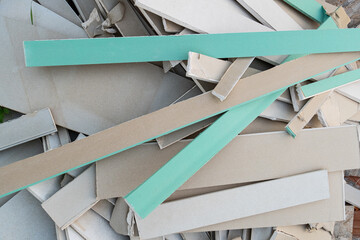 construction waste water resistant plasterboard drywall, pieces debris during the construction...