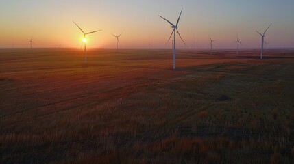 Renewable energy, wind turbines, large field, sunset, showcasing clean and sustainable power