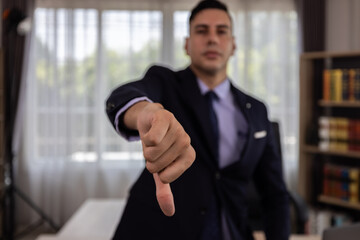 Businessman Showing Thumbs Down