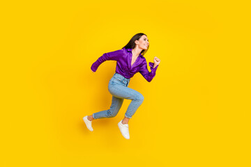 Photo of positive lady jump run profile side isolated bright color background
