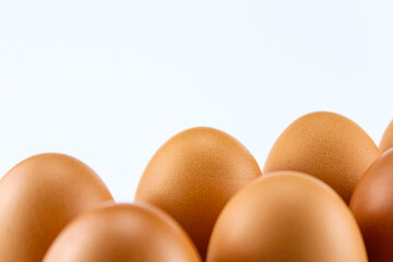 Eggs photographed in close up look artistic on a white isolated background