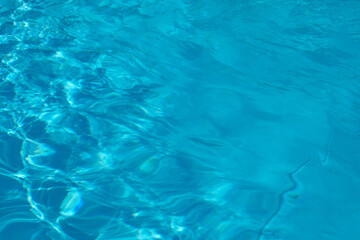 Blue water ripples in sunlight