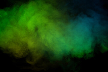Blue and green steam on a black background.