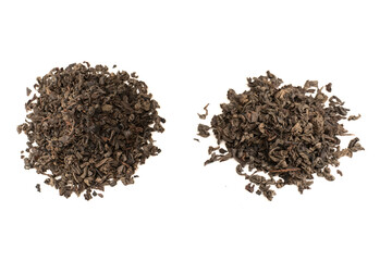 Dried tea leaves isolated on a white background.