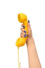 Yellow handset in woman hand isolated on white. Copy space.