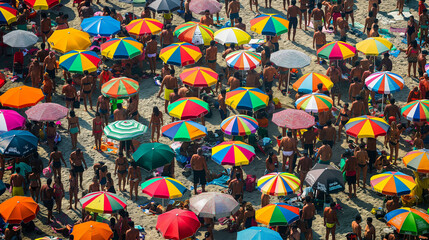 A sunny day captures throngs of beach-goers under vibrant umbrellas, watched over by watchful lifeguards from towering posts.