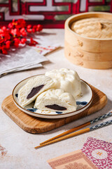 Baozi, Chinese Steamed Buns is a type of yeast-leavened filled bun in various Chinese cuisines.