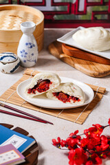 Baozi, Chinese Steamed Buns is a type of yeast-leavened filled bun in various Chinese cuisines.