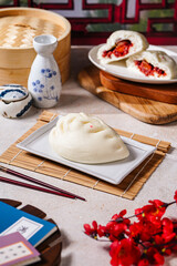 Baozi, Chinese Steamed Buns is a type of yeast-leavened filled bun in various Chinese cuisines.