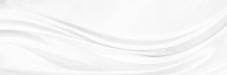White gray satin texture that is white silver fabric silk background with beautiful soft blur pattern natural.