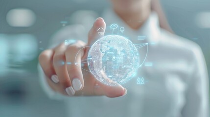 Close-up of woman interacting with holographic globe interface in modern office symbolizing global connectivity and technology