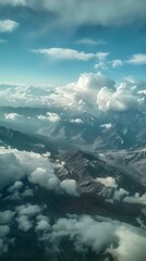 Fototapeta premium Aerial View of Mountain Ranges Covered in Clouds