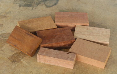 Pile of cut wooden blocks and planks, wood material