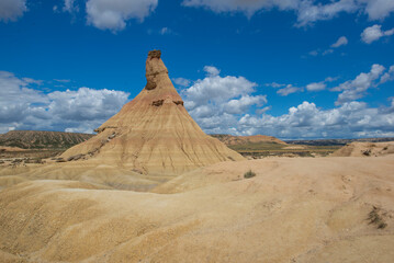 View of Castildetierra, the famous  fairy chimney of the Bardenas Reales desert in Spain under cloudy sky