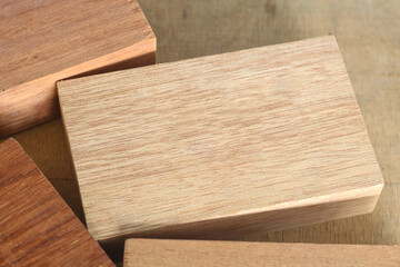 Pile of cut wooden blocks and planks, wood material