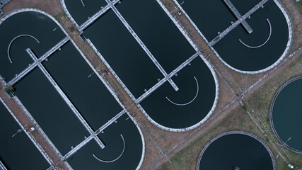 Aerial view of wastewater treatment plant, Water cleaning facility wastewater treatment plant, Waste management sewage and water treatment plants waste water purification.