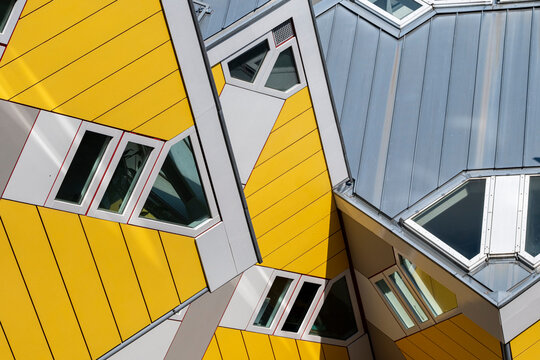 Kubuswoning or Cube Houses building with striking triangular windows and intricate patterns, showcasing modern architectural aesthetics and dynamic design in Rotterdam